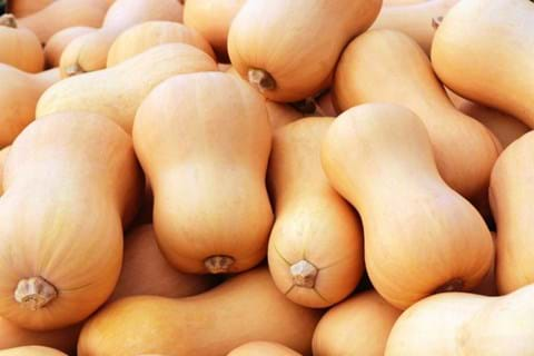 Butternut pumpkins stacked on top of each other