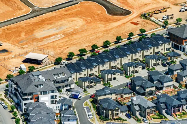 newly developed suburb with black roofs